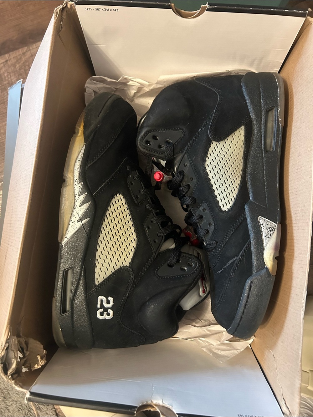 Jordan Men’s Black and Cream Air Jordan 5 Sneakers